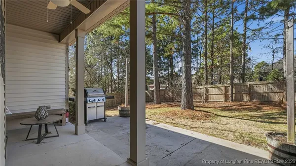 a view of a backyard of the house