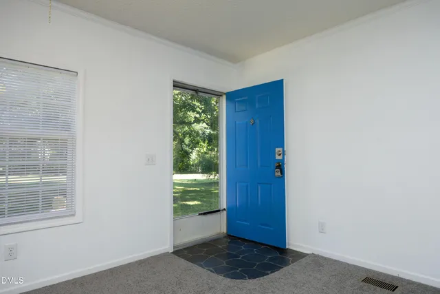 a view of an entryway with a window