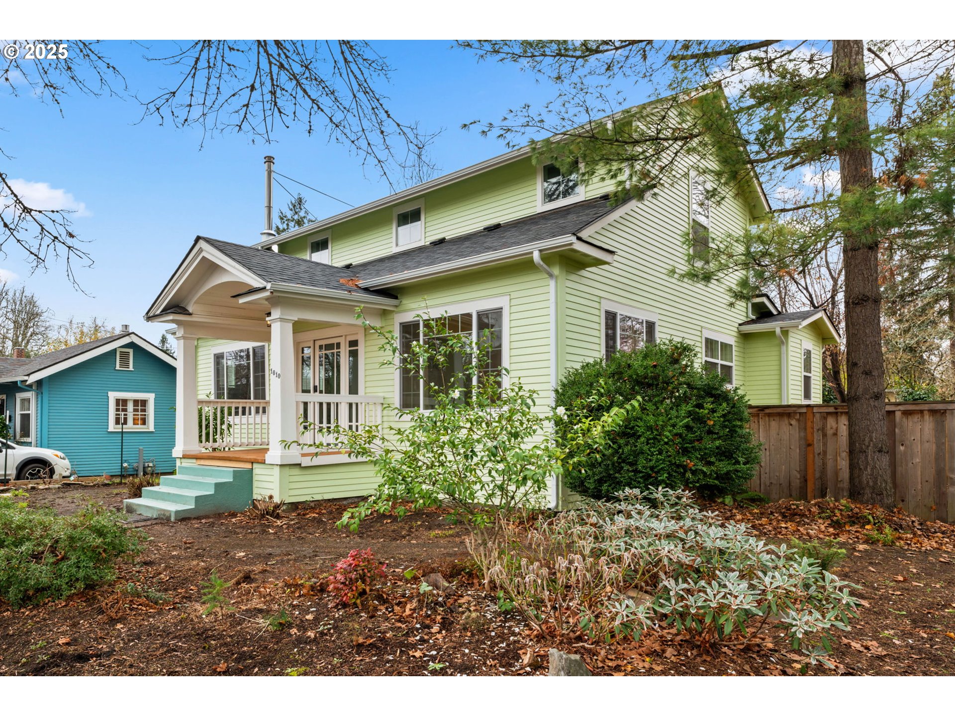 1010 Monroe Street Eugene, OR 97402 - Photo 3 of 40 a front view of a house with garden