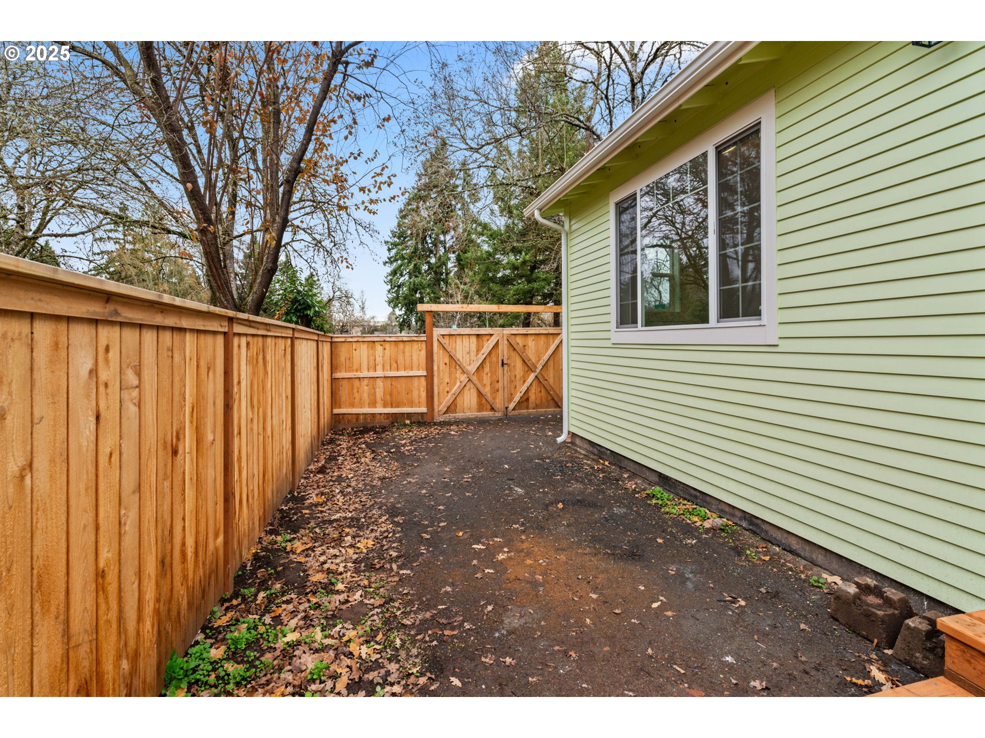 1010 Monroe Street Eugene, OR 97402 - Photo 33 of 40 a view of a backyard with trees