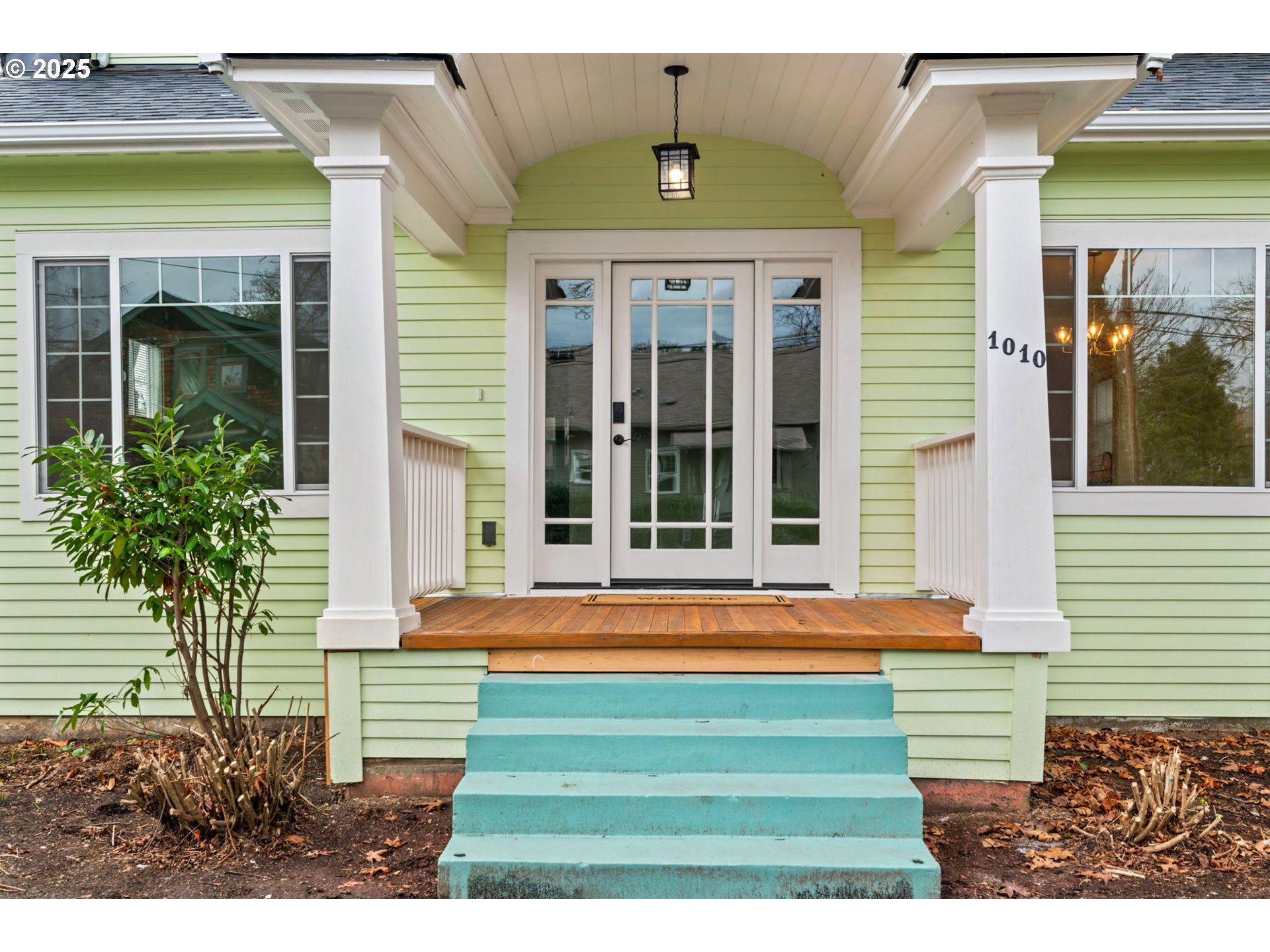 1010 Monroe Street Eugene, OR 97402 - Photo 4 of 40 a front view of a house with a yard