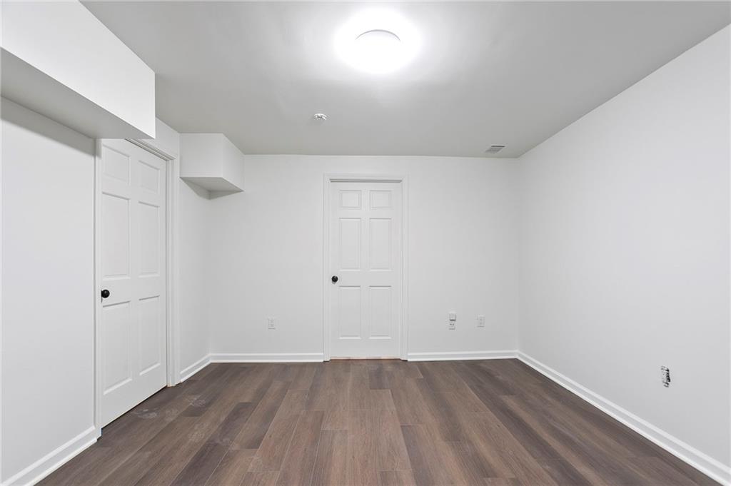4555 Runnemede Road Northwest Atlanta, GA 30327 - Photo 24 of 51 a view of an empty room