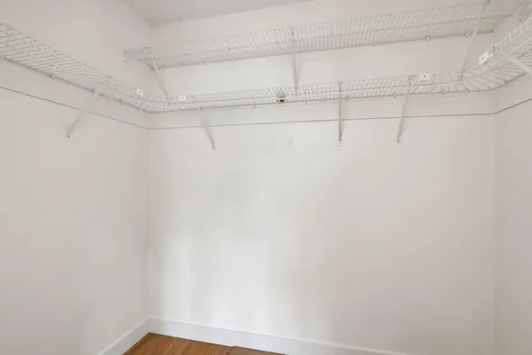 a view of a room with racks on the wall