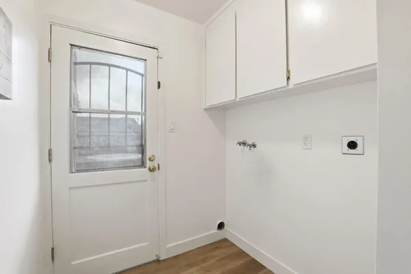 a view of small space with wooden floor
