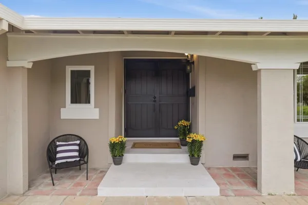 a view of a entryway door front of house