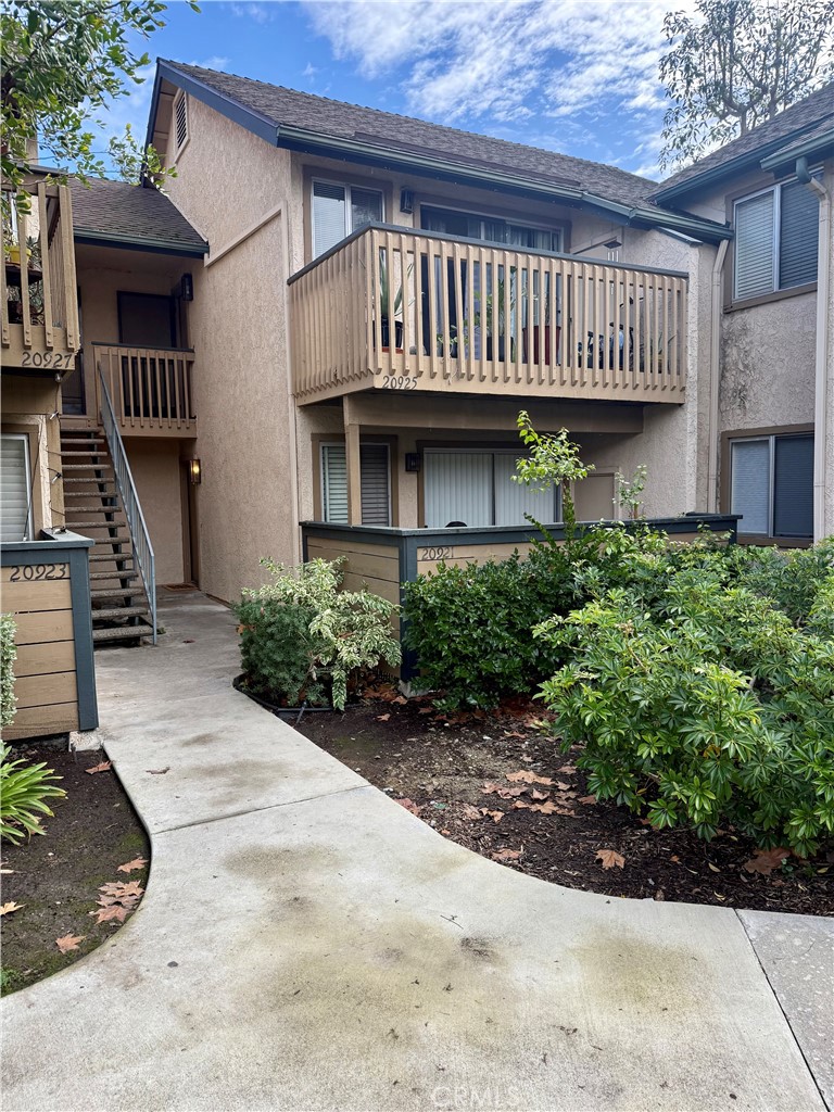 20921 Serrano Creek Road, Unit 55 Lake Forest, CA 92630 - Photo 1 of 1 a view of a house with backyard and plants