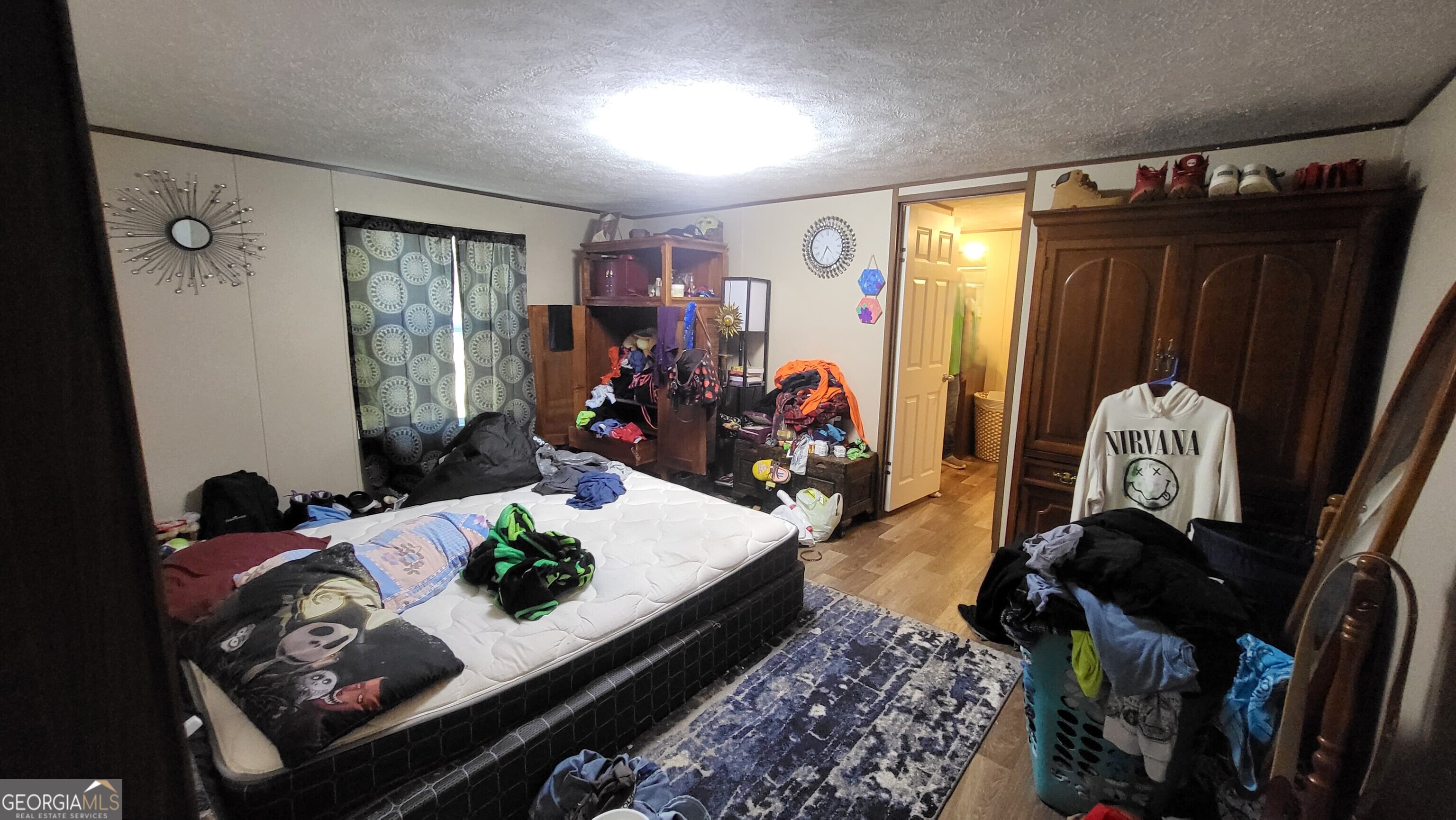 835 Center Of The World Road Canon, GA 30520 - Photo 4 of 9 a living room with furniture and a window