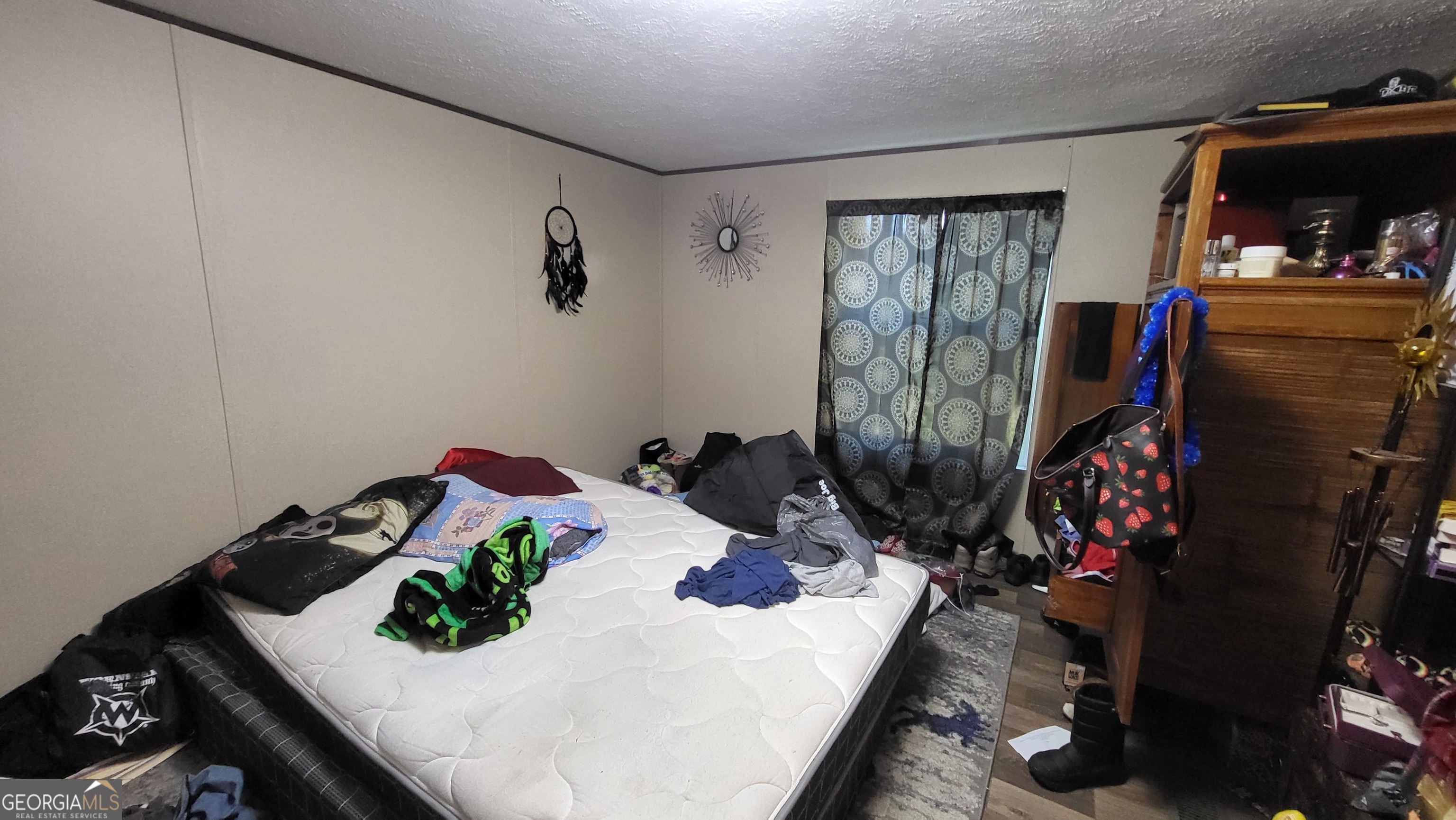 835 Center Of The World Road Canon, GA 30520 - Photo 5 of 9 a view of a workspace with furniture