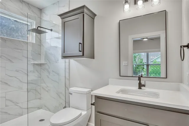 a view of a hallway with a chandelier