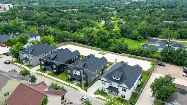 an aerial view of house with yard
