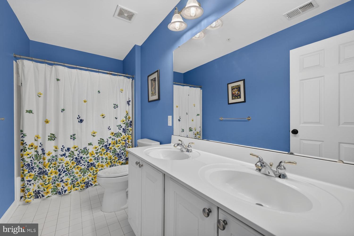 23106 Birch Mead Road Clarksburg, MD 20871 - Photo 27 of 60 a bathroom with a sink toilet and shower