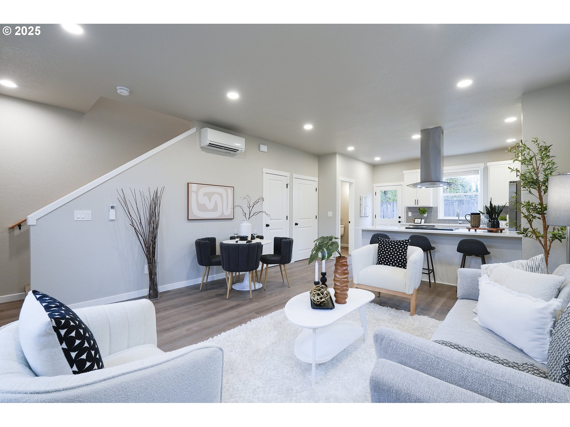 4537 Southeast 97th Avenue Portland, OR 97266 - Photo 5 of 16 a living room with furniture and a view of kitchen