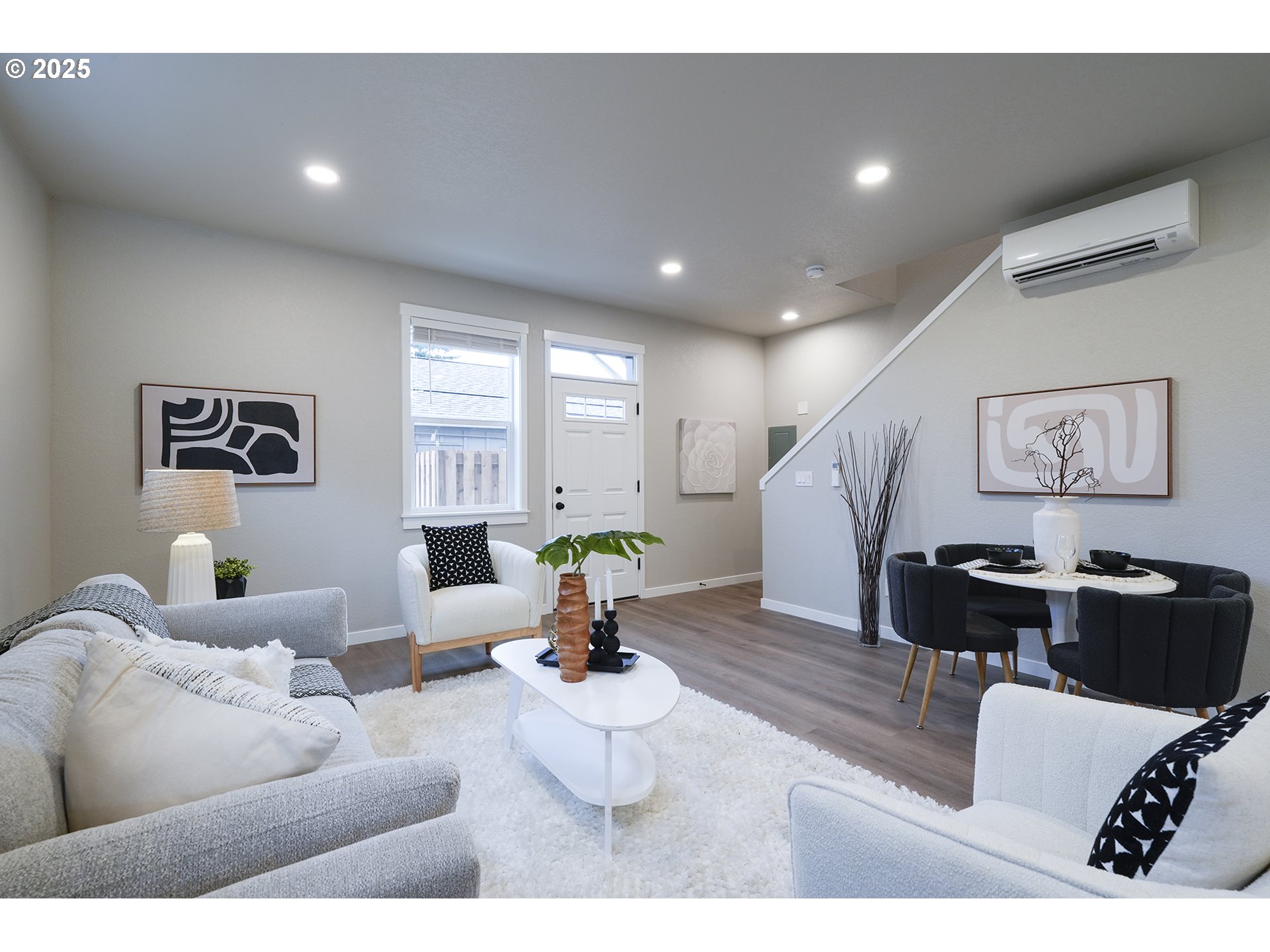 4537 Southeast 97th Avenue Portland, OR 97266 - Photo 7 of 16 a living room with furniture and wooden floor