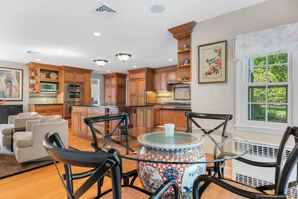 a dining room with furniture and a table