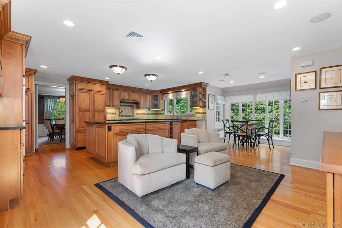 26 Old Orchard Road North Haven, CT 06473 - Photo 19 of 38 a living room with furniture and a wooden floor