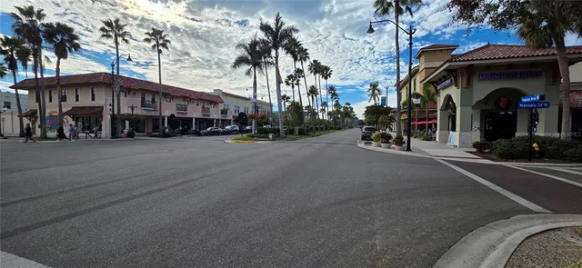 a view of a street with cars