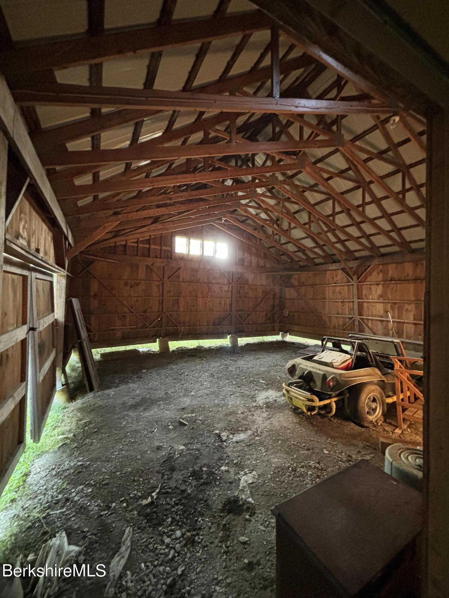 1435 River Road Clarksburg, MA 01247 - Photo 12 of 55 a view of a backyard with table and chairs