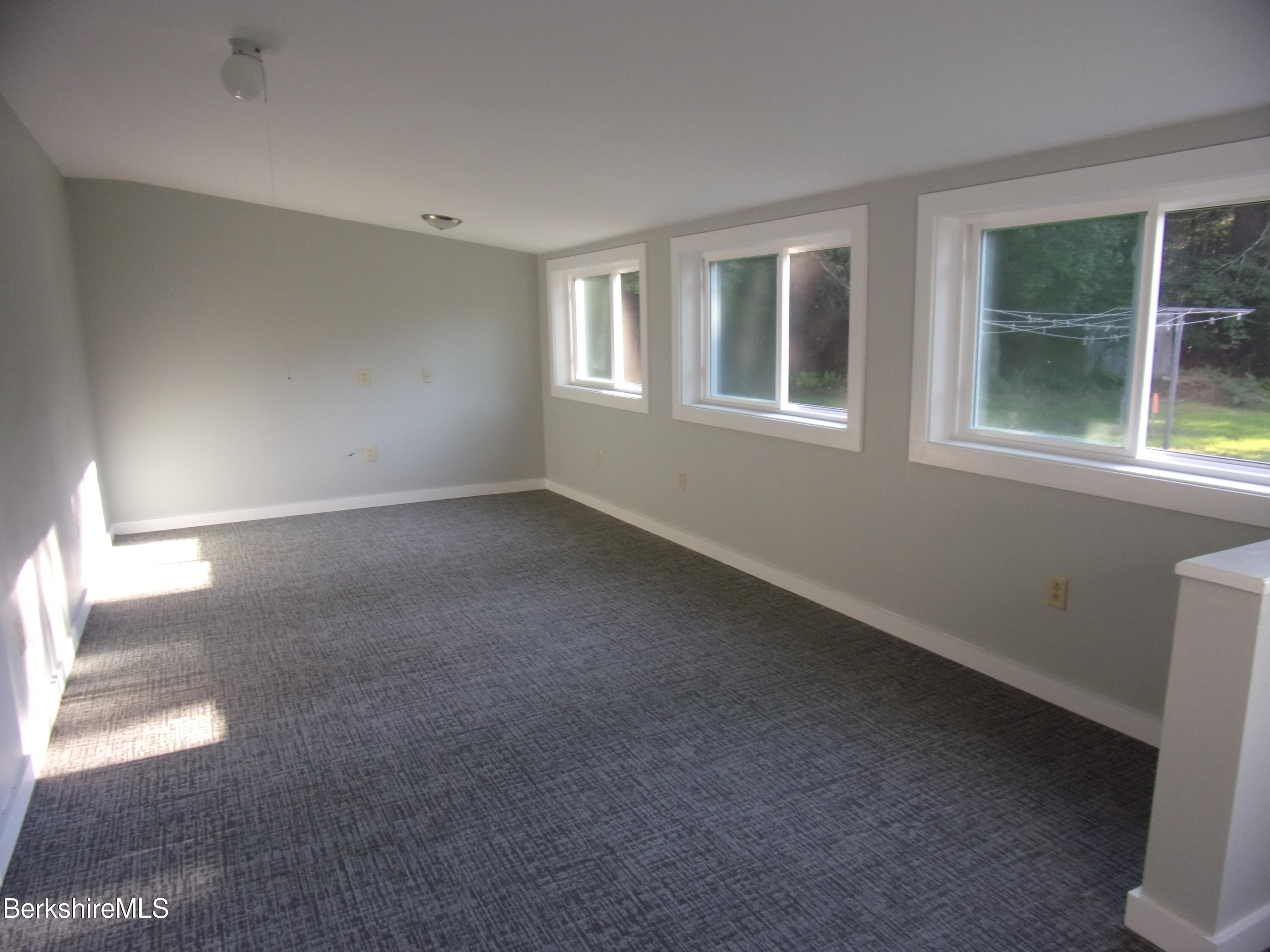 1435 River Road Clarksburg, MA 01247 - Photo 16 of 55 a view of an empty room with a window