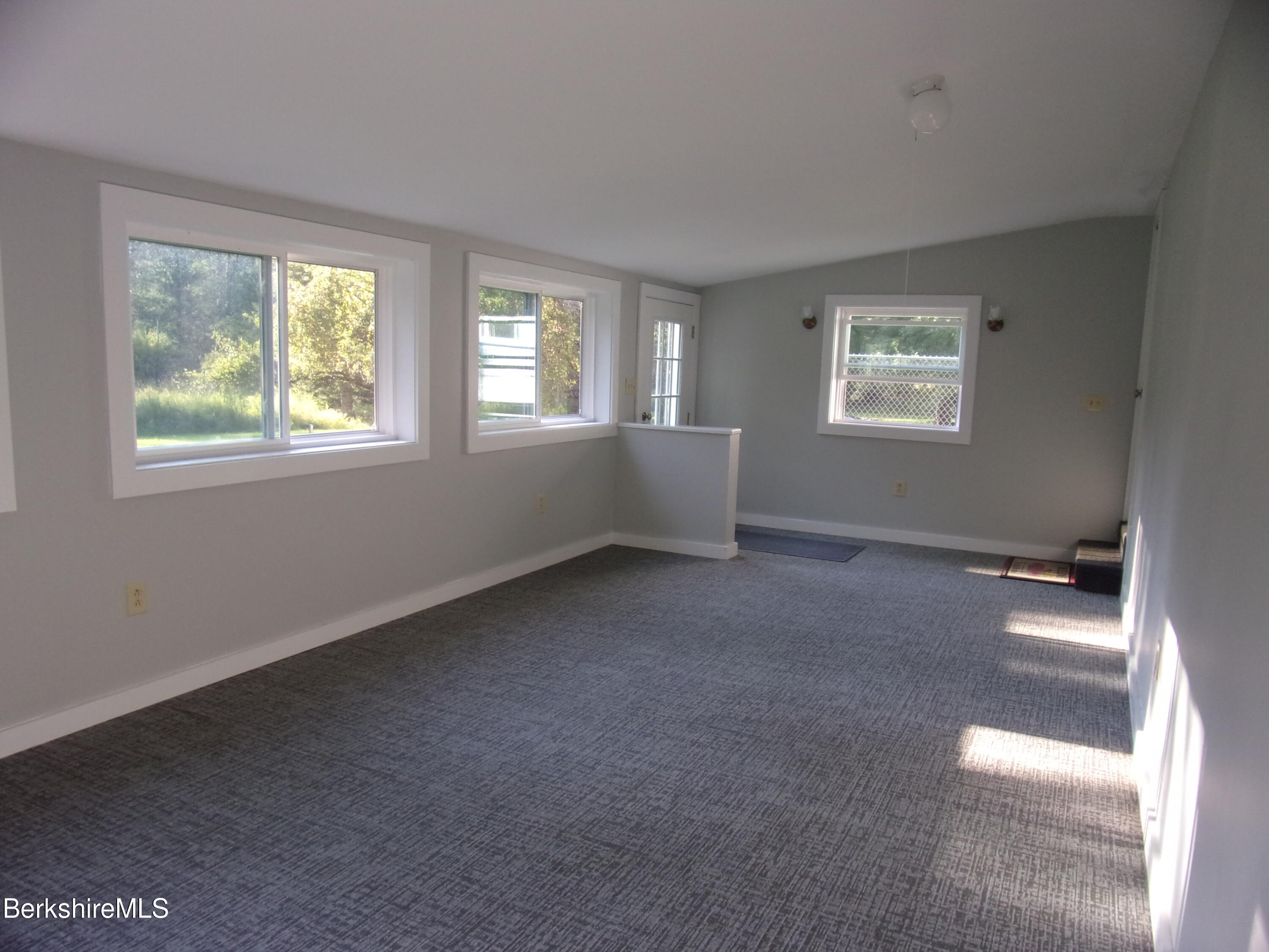 1435 River Road Clarksburg, MA 01247 - Photo 17 of 55 an empty room with windows
