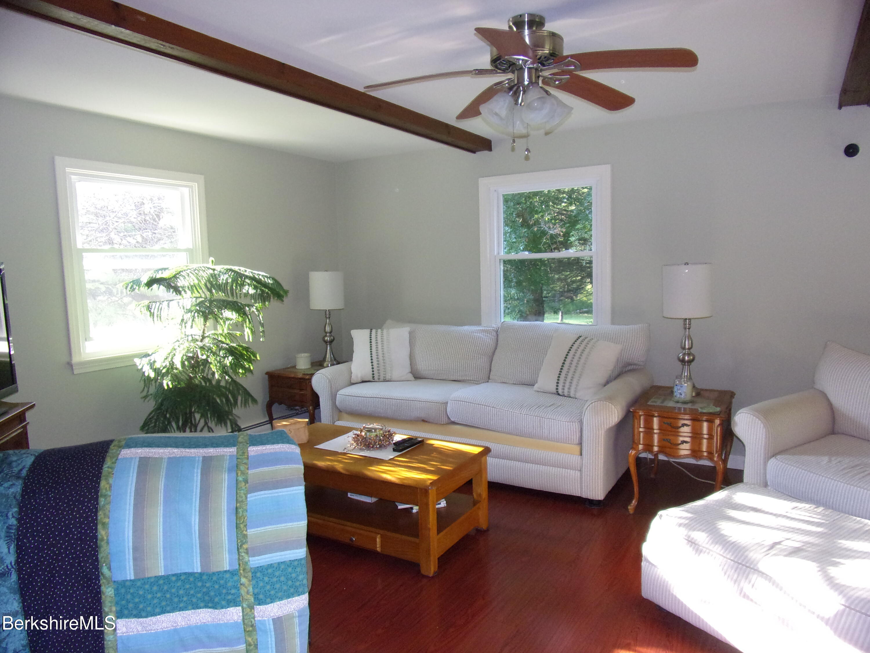 1435 River Road Clarksburg, MA 01247 - Photo 24 of 55 a living room with furniture and a window