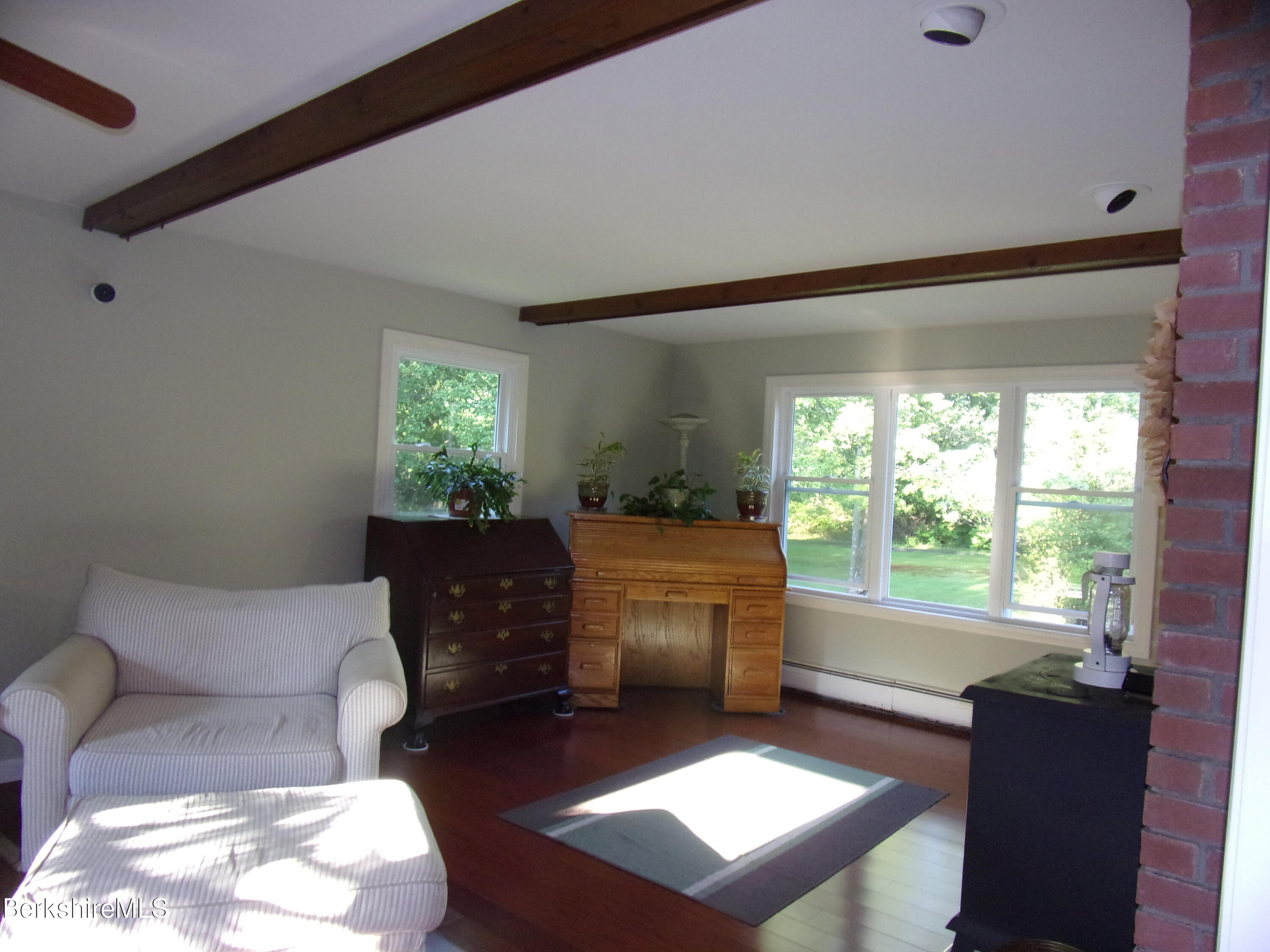 1435 River Road Clarksburg, MA 01247 - Photo 27 of 55 a living room with furniture and a window