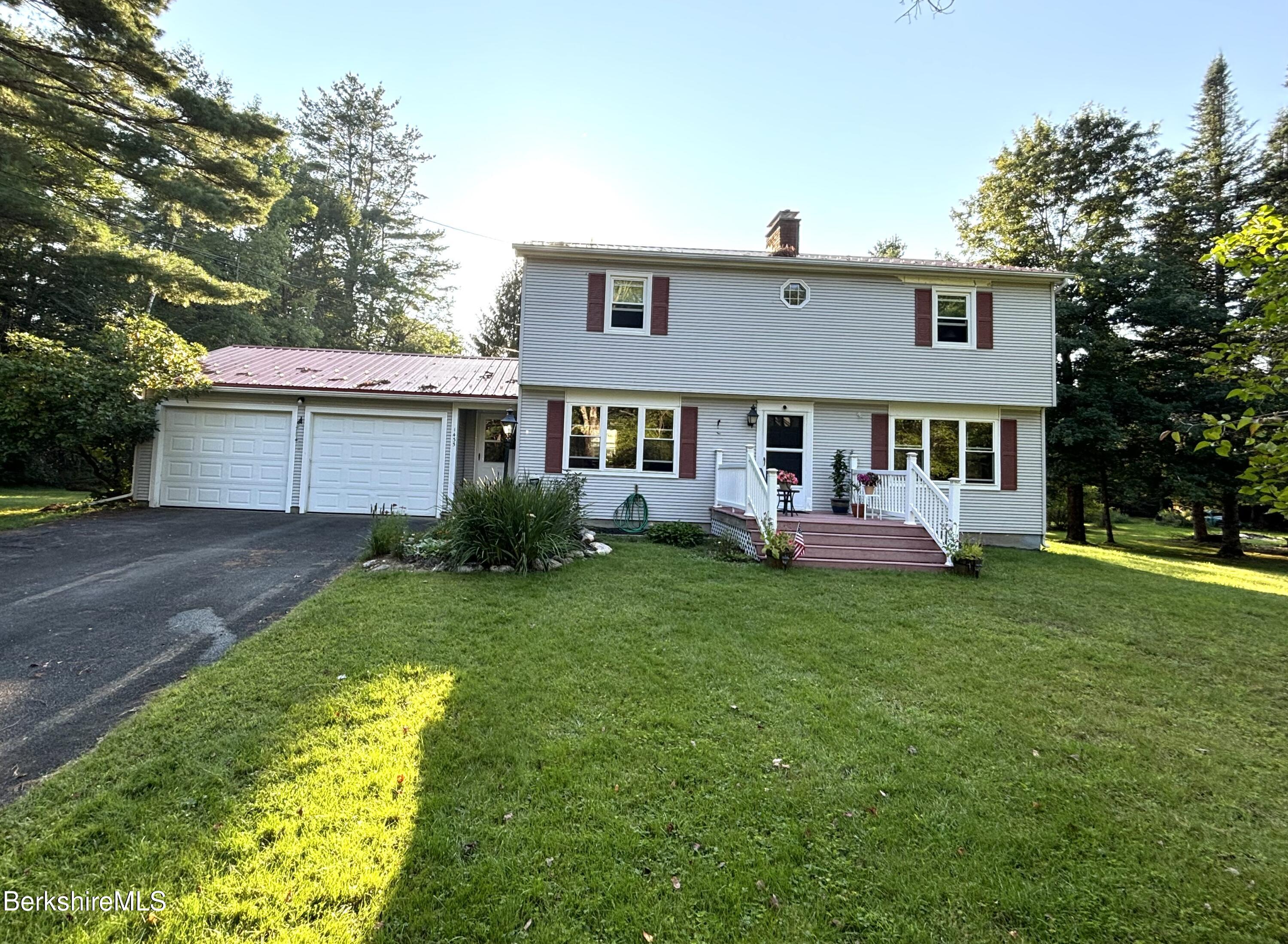 1435 River Road Clarksburg, MA 01247 - Photo 3 of 55 a front view of a house with a yard
