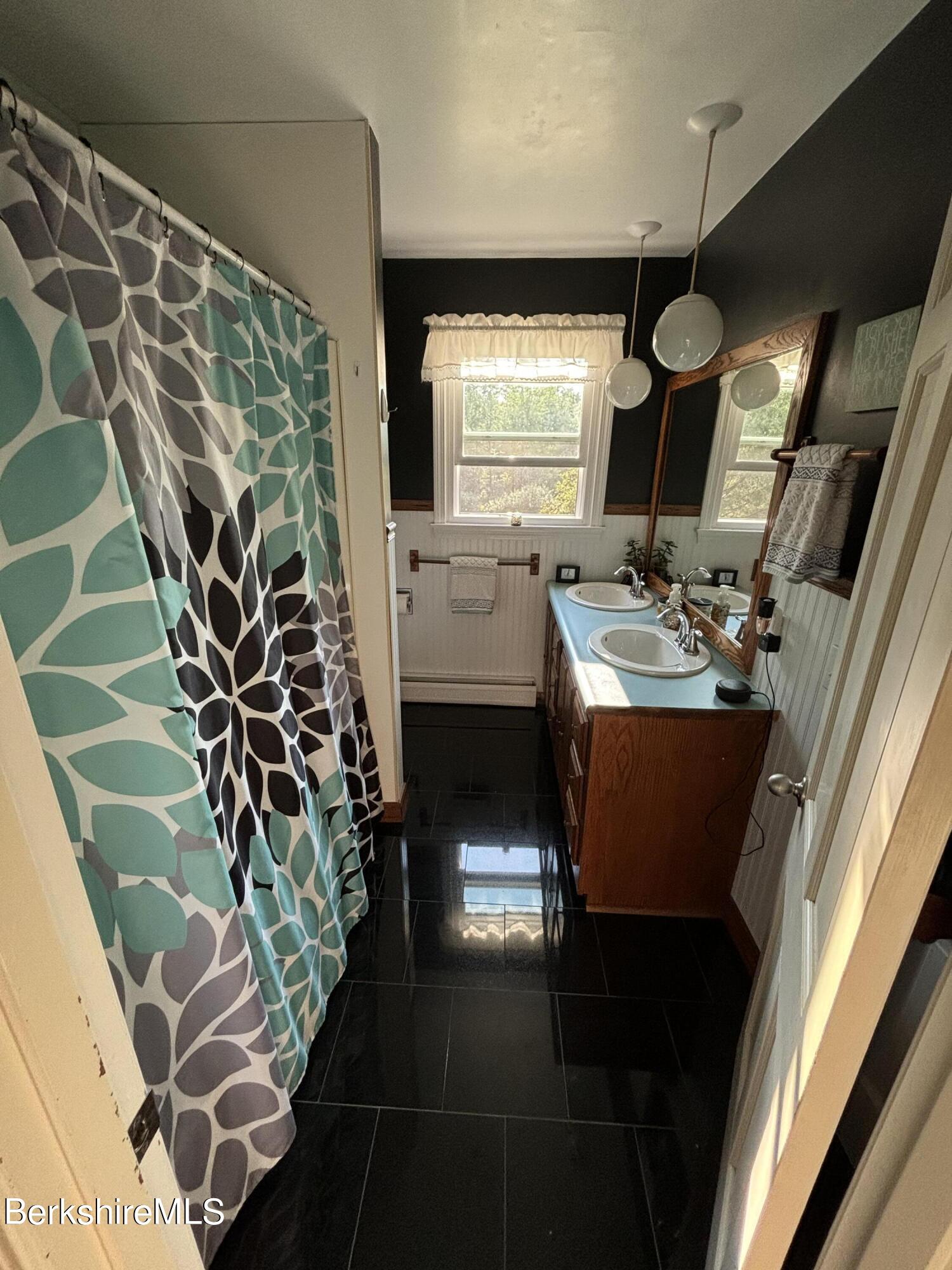 1435 River Road Clarksburg, MA 01247 - Photo 33 of 55 a bathroom with a sink toilet and mirror