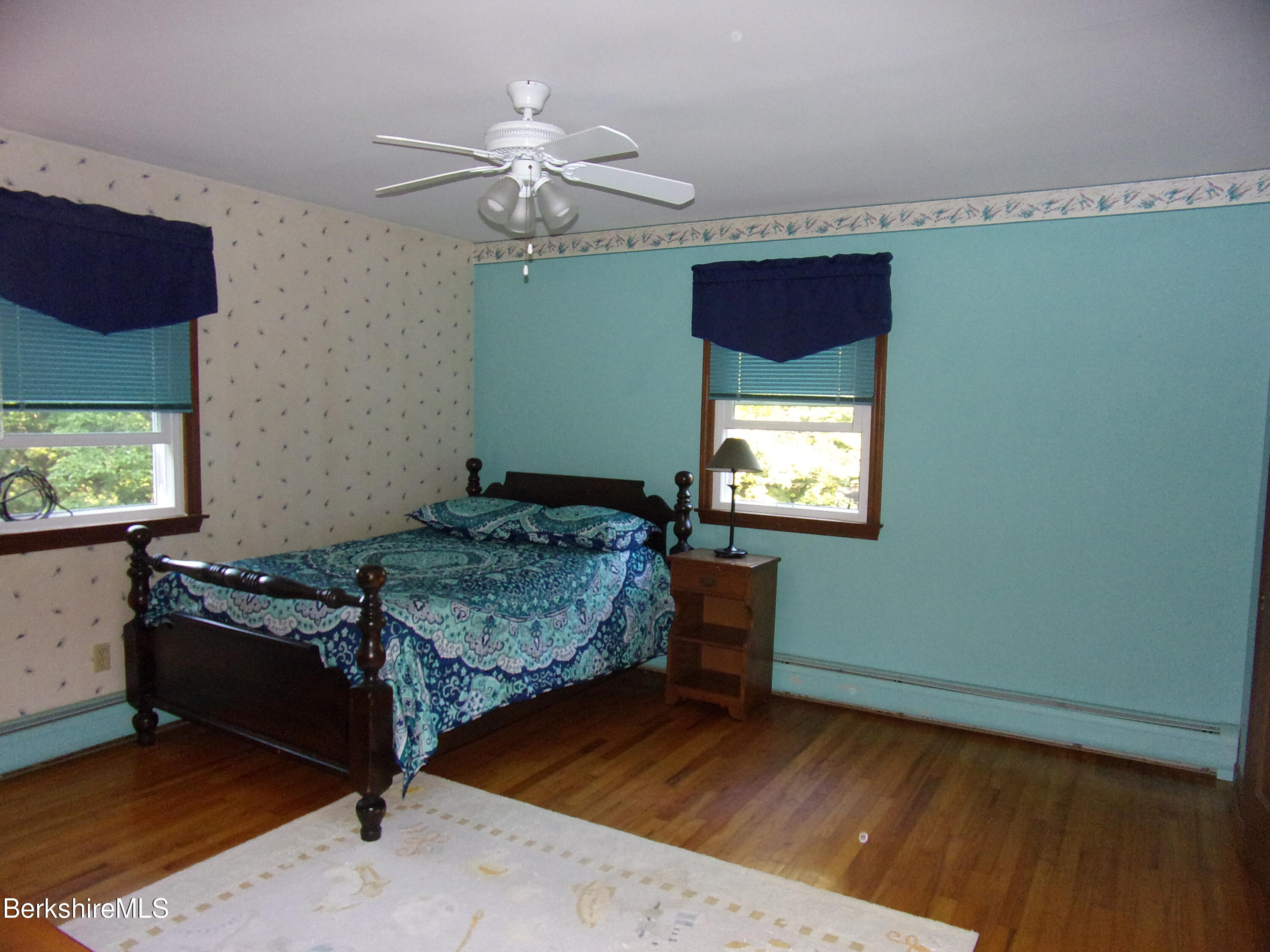 1435 River Road Clarksburg, MA 01247 - Photo 40 of 55 a bedroom with a bed and a window