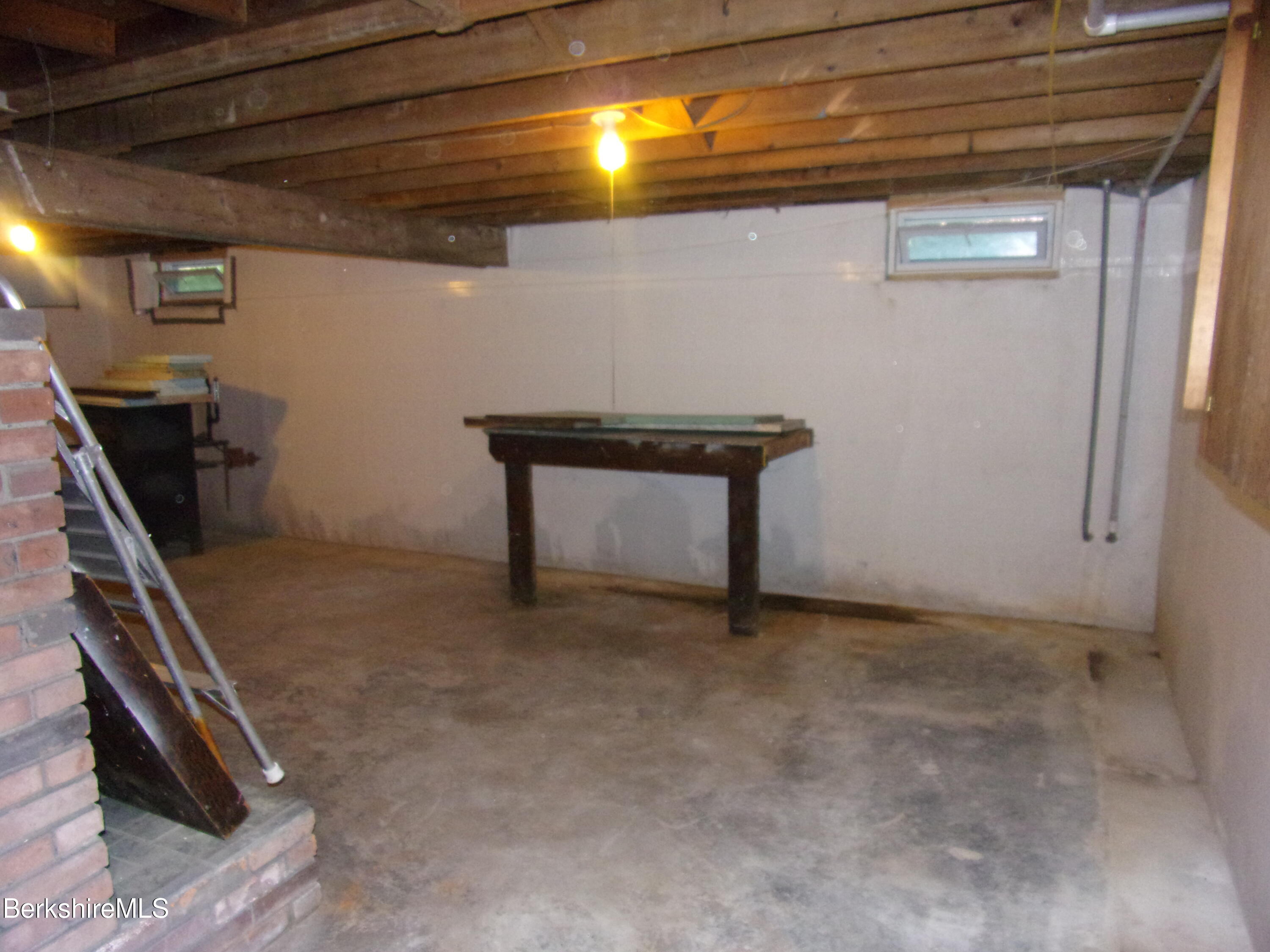 1435 River Road Clarksburg, MA 01247 - Photo 45 of 55 a view of an empty room with wooden floor