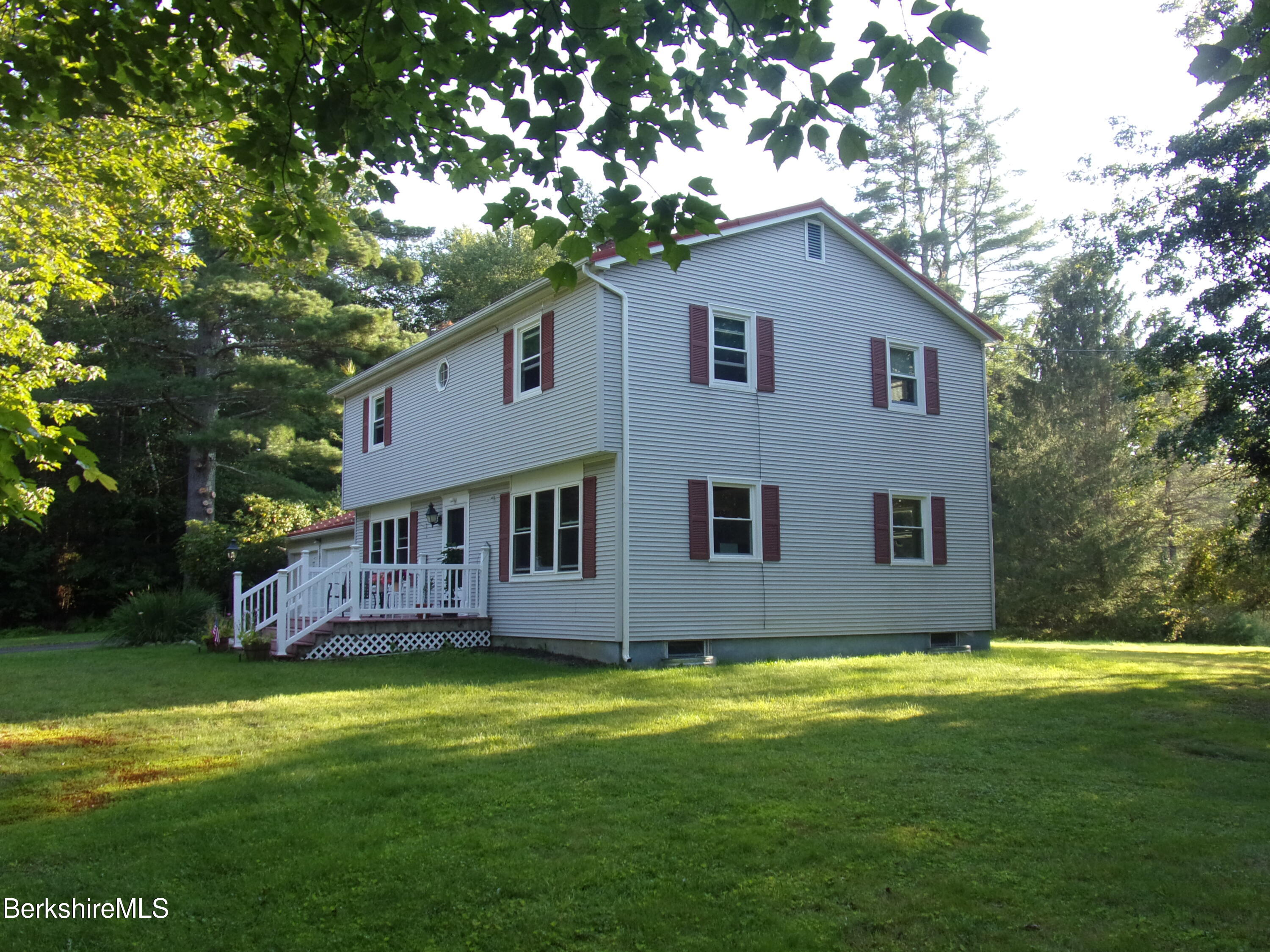 1435 River Road Clarksburg, MA 01247 - Photo 5 of 55 a front view of house with yard and green space
