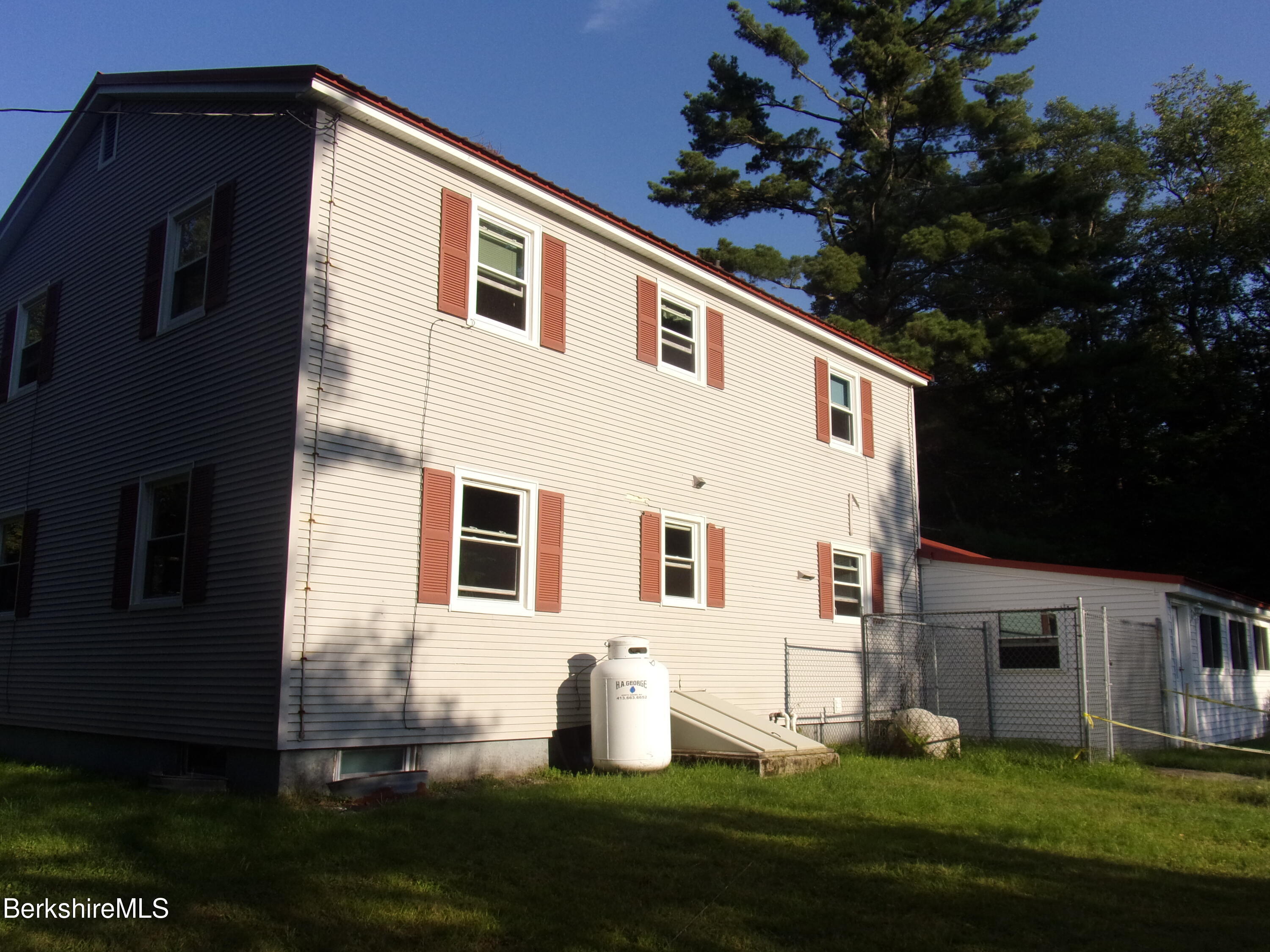 1435 River Road Clarksburg, MA 01247 - Photo 6 of 55 a front view of a house with a yard