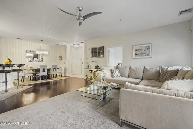 a living room with furniture and a view of living room