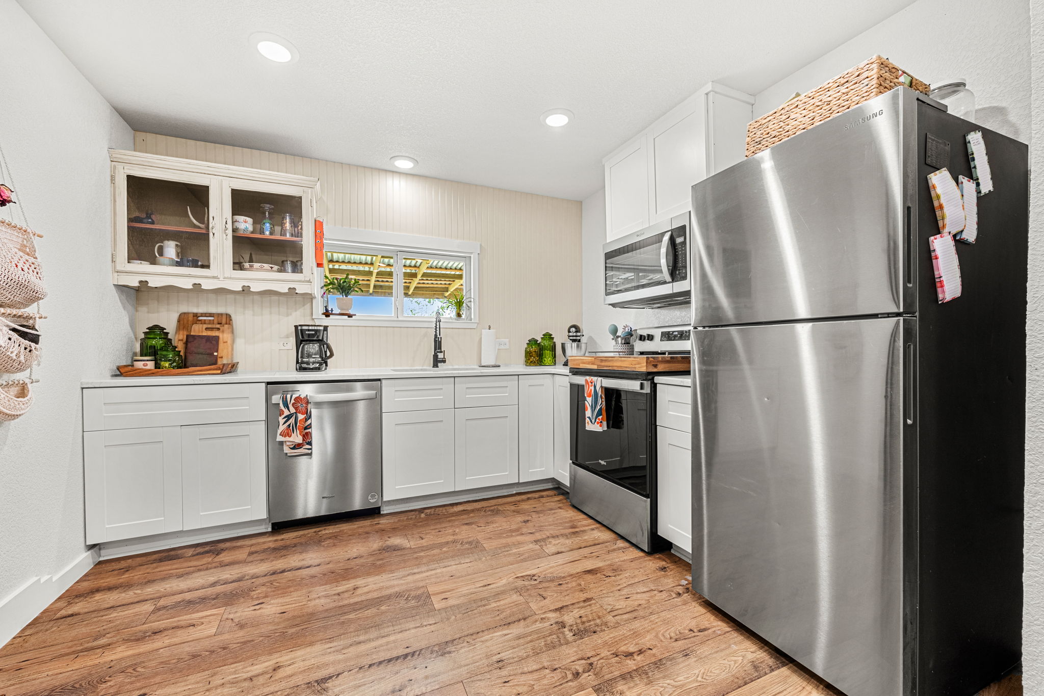 13390 Bendle Road Troy, TX 76579 - Photo 12 of 30 a kitchen with stainless steel appliances a refrigerator sink and cabinets