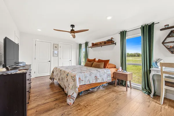 a view of swimming pool with outdoor seating and yard