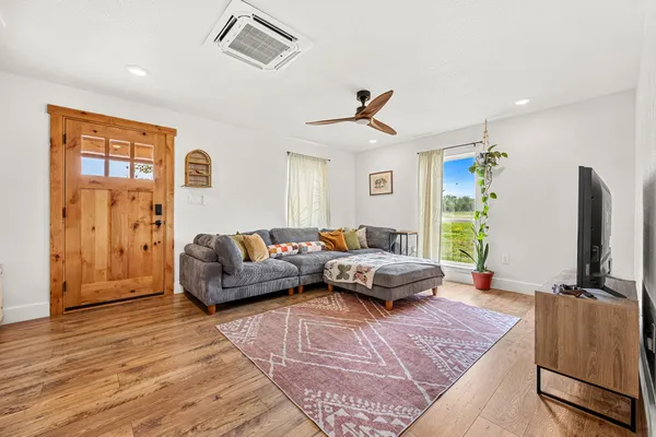 a kitchen with stainless steel appliances a sink stove and refrigerator