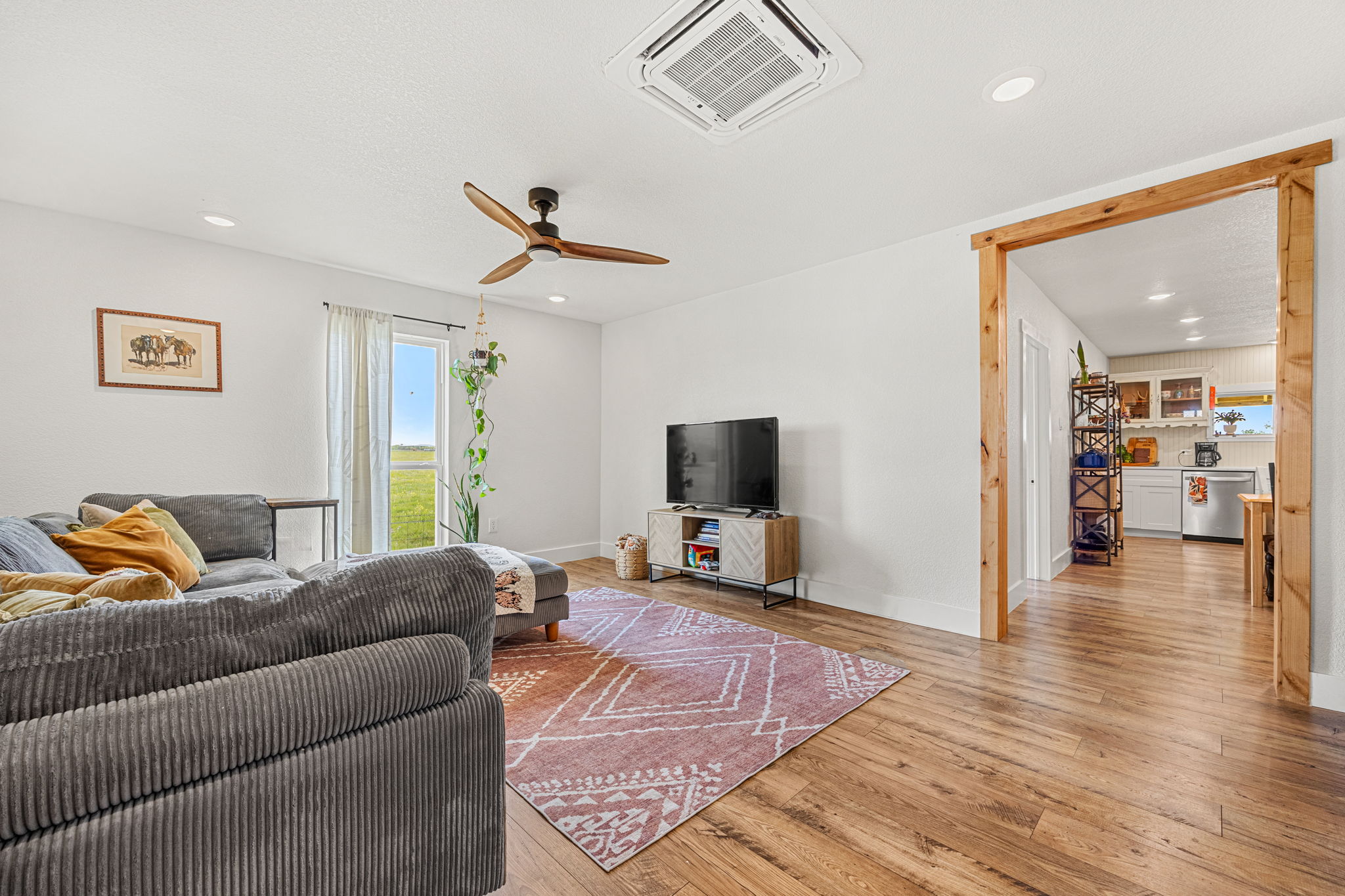 13390 Bendle Road Troy, TX 76579 - Photo 20 of 30 a living room with furniture and a flat screen tv