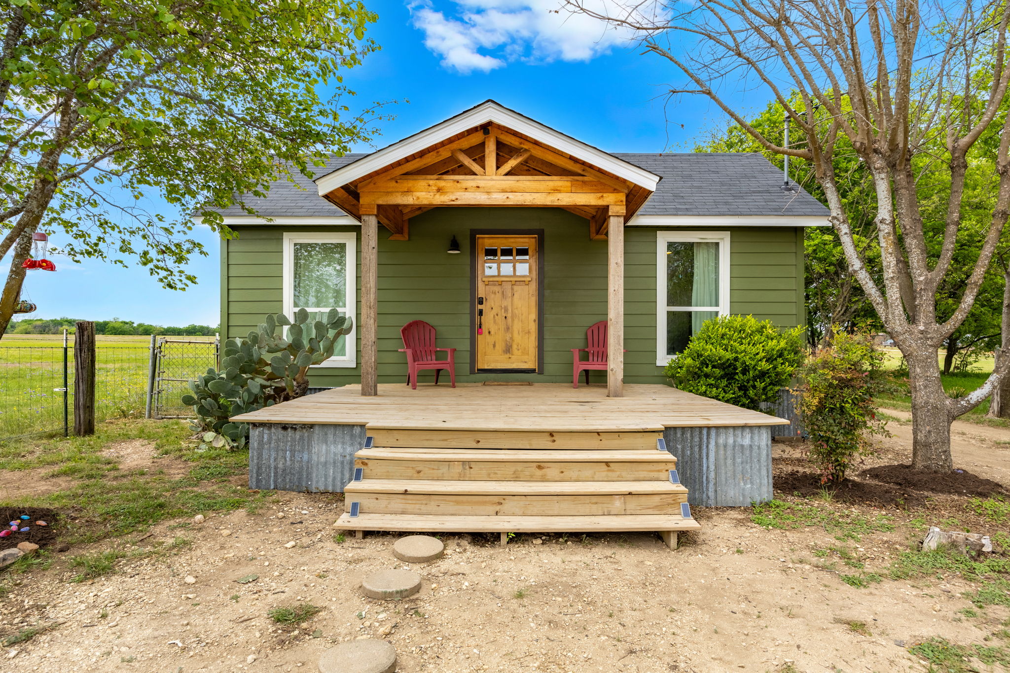 13390 Bendle Road Troy, TX 76579 - Photo 28 of 30 a front view of a house with garden