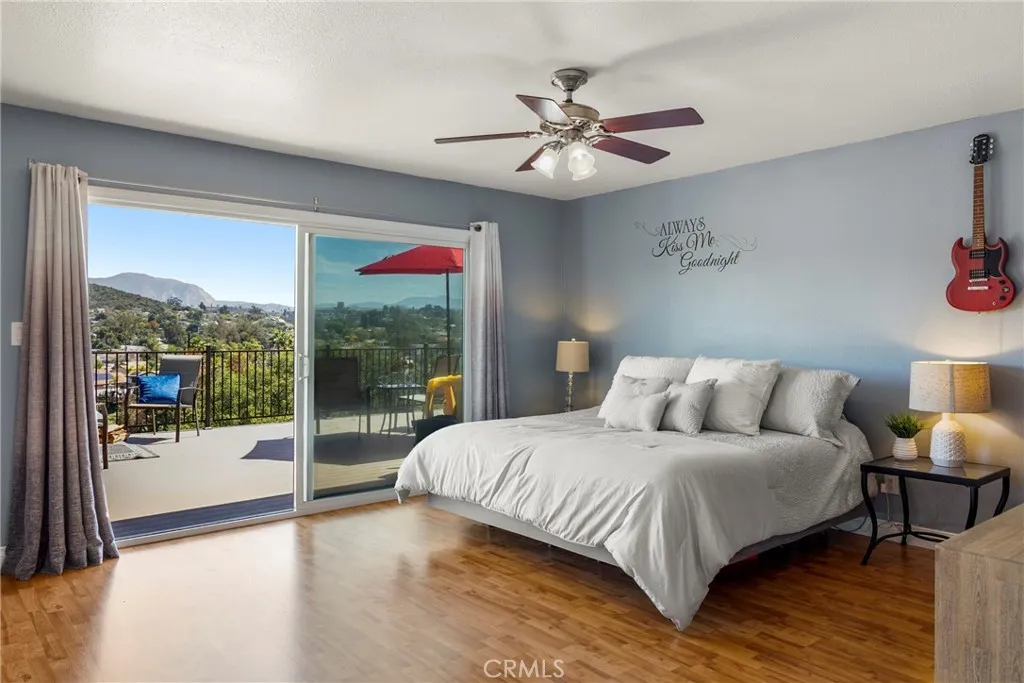 8861 Los Coches Road, Unit 1 Lakeside, CA 92040 - Photo 21 of 45 a bedroom with a large bed and a window