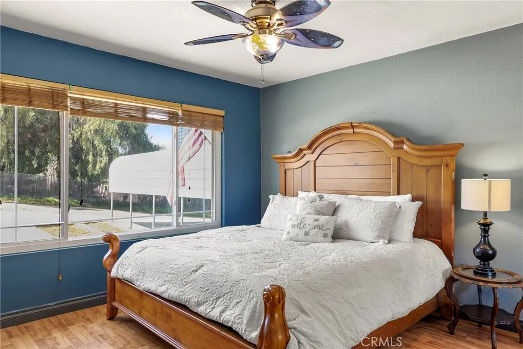 8861 Los Coches Road, Unit 1 Lakeside, CA 92040 - Photo 28 of 45 a bedroom with a bed and window