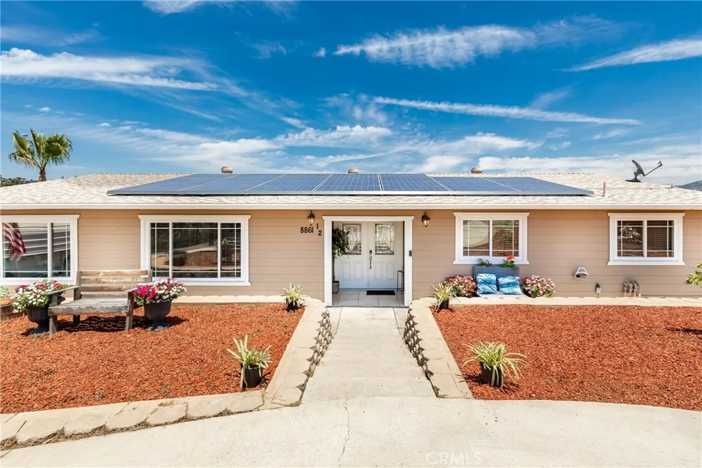 8861 Los Coches Road, Unit 1 Lakeside, CA 92040 - Photo 41 of 45 a front view of a house with a patio