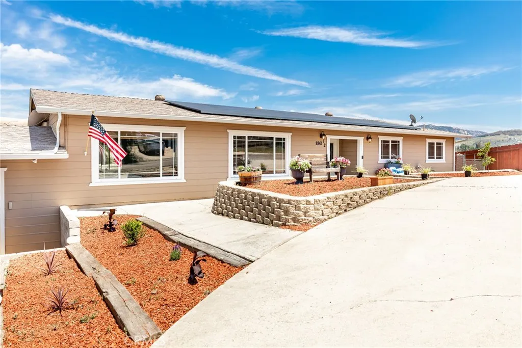 8861 Los Coches Road, Unit 1 Lakeside, CA 92040 - Photo 42 of 45 a bedroom with furniture and a table