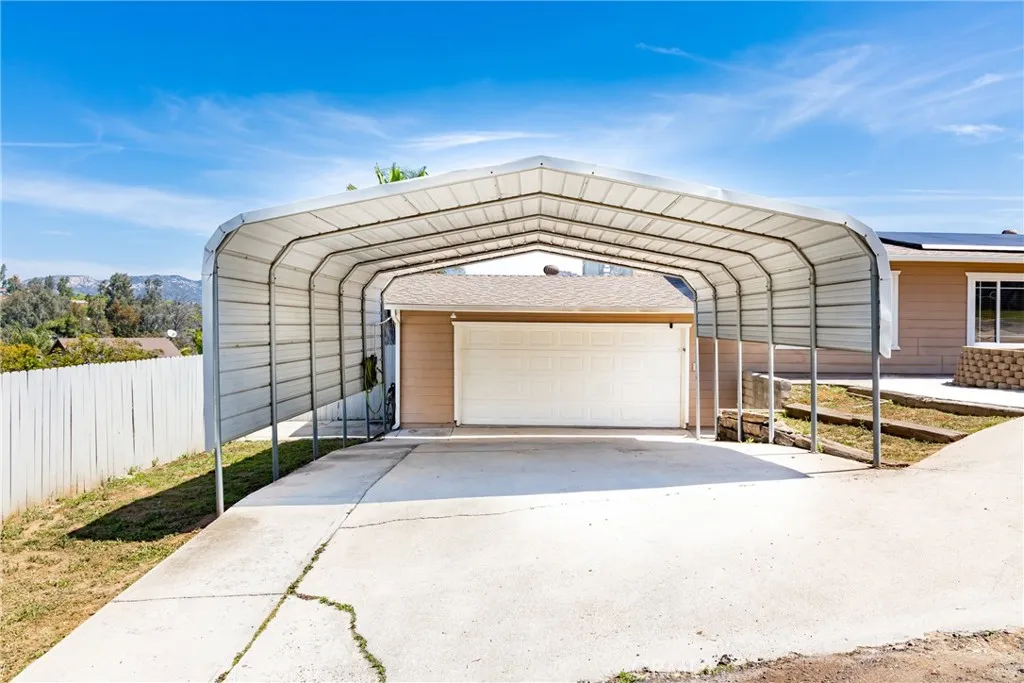 8861 Los Coches Road, Unit 1 Lakeside, CA 92040 - Photo 44 of 45 a front view of a house with a garage