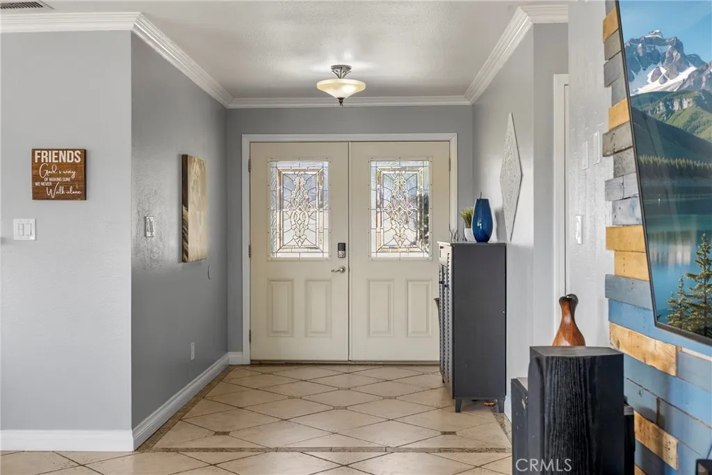 8861 Los Coches Road, Unit 1 Lakeside, CA 92040 - Photo 5 of 45 a view of a hallway with windows and entryway