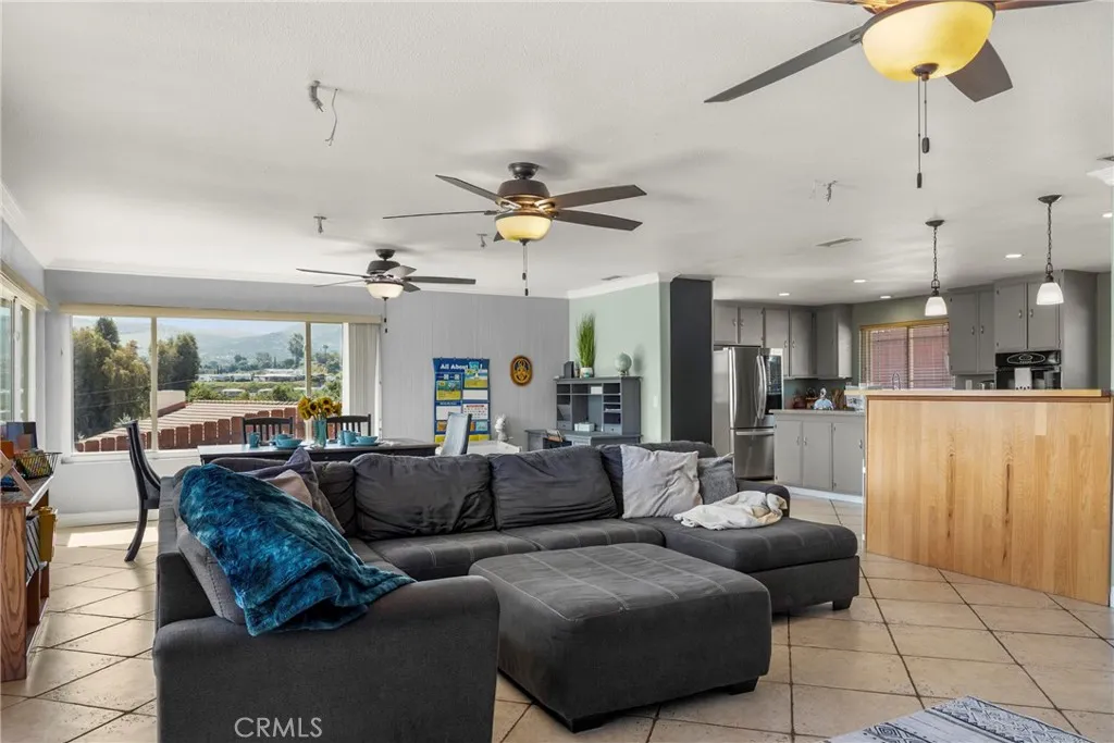 8861 Los Coches Road, Unit 1 Lakeside, CA 92040 - Photo 7 of 45 a living room with furniture and a large window