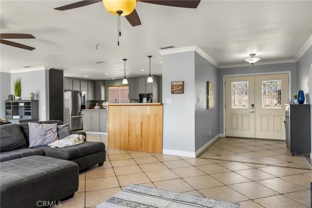 8861 Los Coches Road, Unit 1 Lakeside, CA 92040 - Photo 8 of 45 a living room with furniture and kitchen view