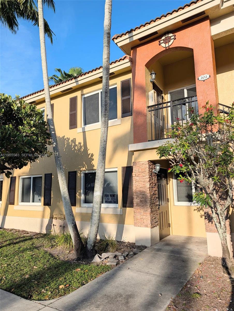 945 Northeast 33rd Terrace, Unit 102 Homestead, FL 33033 - Photo 1 of 6