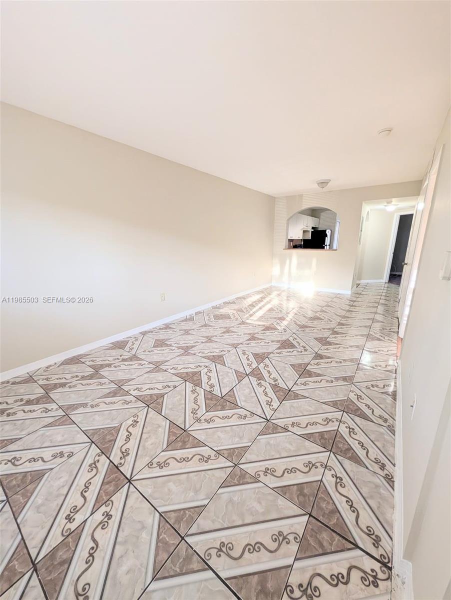 945 Northeast 33rd Terrace, Unit 102 Homestead, FL 33033 - Photo 2 of 6