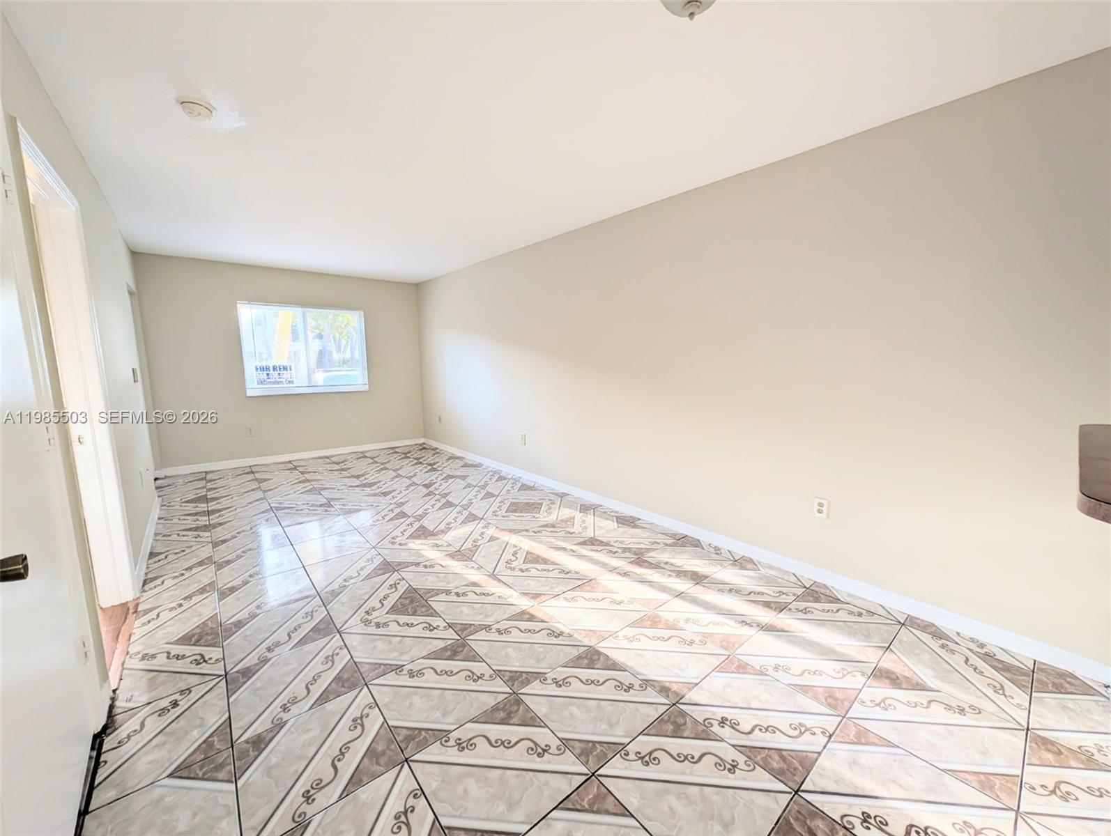 945 Northeast 33rd Terrace, Unit 102 Homestead, FL 33033 - Photo 3 of 6