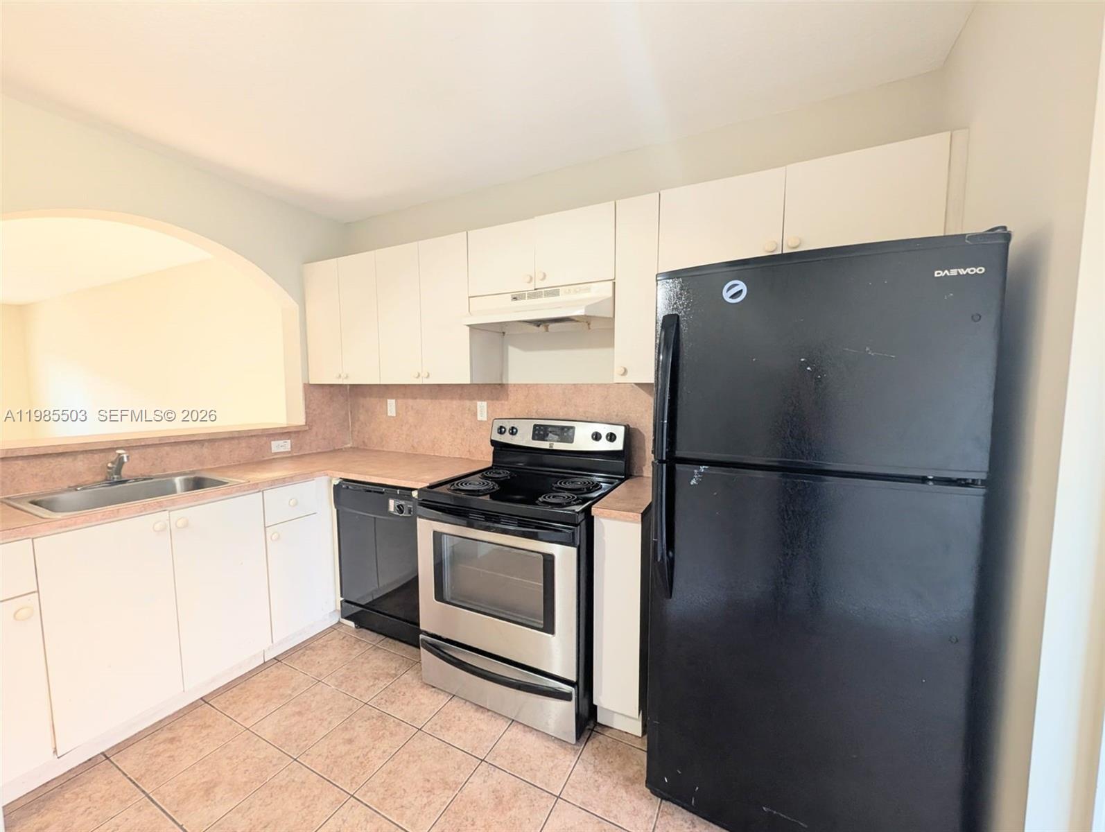945 Northeast 33rd Terrace, Unit 102 Homestead, FL 33033 - Photo 4 of 6