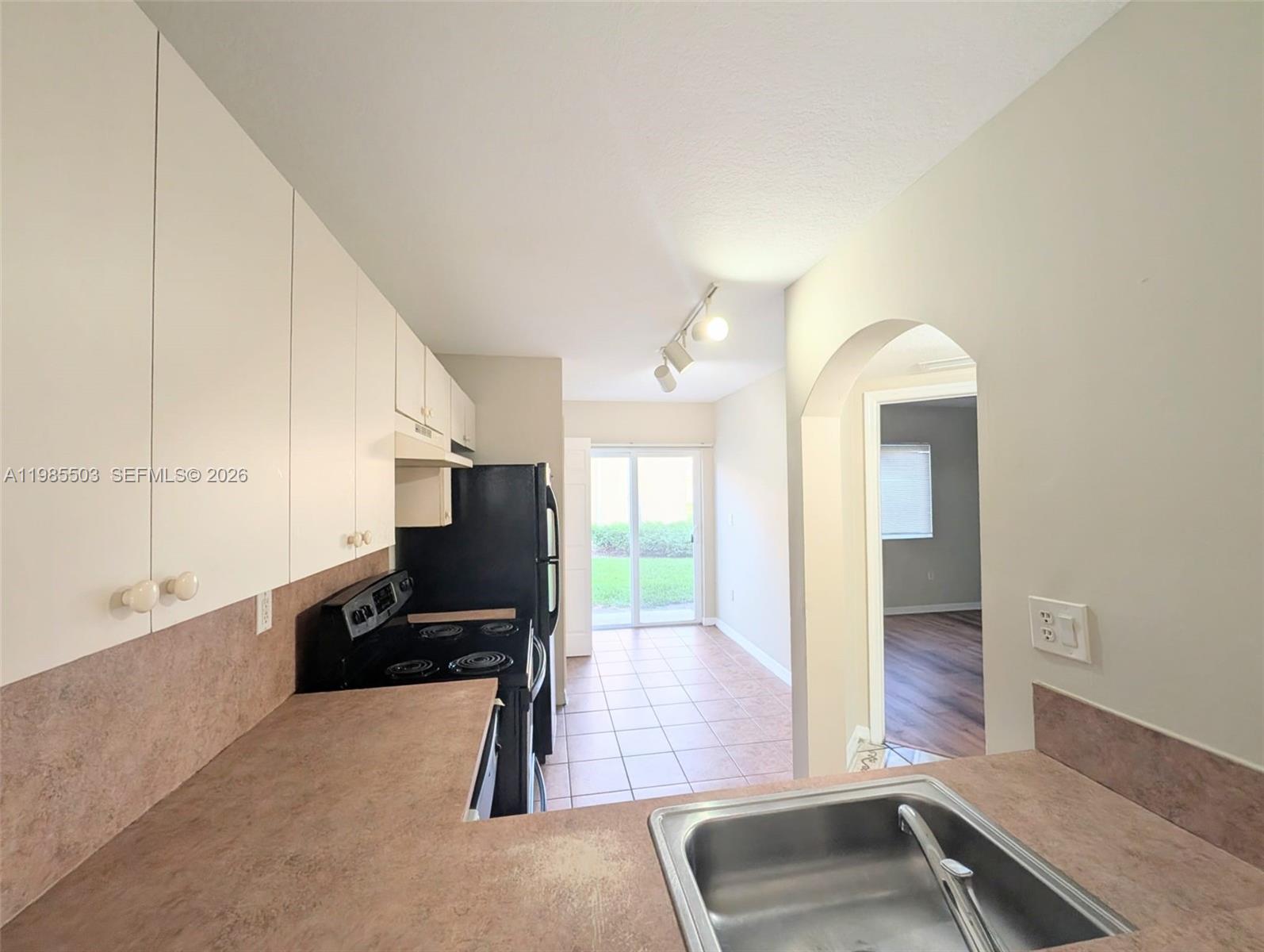 945 Northeast 33rd Terrace, Unit 102 Homestead, FL 33033 - Photo 5 of 6